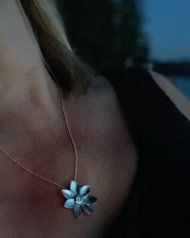 floral pendant in silver by Susan Ohrn Jewelry